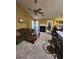 Living room with fireplace, neutral carpet, and plenty of natural light at 2210 Burdett Ridge, Atlanta, GA 30349