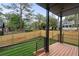 Modern deck overlooks fenced backyard with lush lawn at 2870 Daws Se Ave, Atlanta, GA 30317