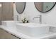 Double vanity with modern rectangular sinks and chrome faucets at 2870 Daws Se Ave, Atlanta, GA 30317