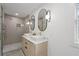 Bathroom with double vanity, walk-in shower, and modern fixtures at 2870 Daws Se Ave, Atlanta, GA 30317