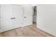 Bright bedroom with hardwood floors, double closets and access to the stairs at 2870 Daws Se Ave, Atlanta, GA 30317