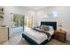 Bright bedroom with sliding glass door to balcony, ensuite bath, and walk-in closet at 2870 Daws Se Ave, Atlanta, GA 30317