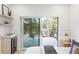 Bedroom with sliding glass door to private balcony and ensuite bath at 2870 Daws Se Ave, Atlanta, GA 30317