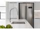 Modern kitchen with stainless steel sink and faucet, marble countertops at 2870 Daws Se Ave, Atlanta, GA 30317