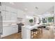 Modern kitchen with white cabinets, marble countertops, and stainless steel appliances at 2870 Daws Se Ave, Atlanta, GA 30317