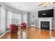 Living room with hardwood floors, fireplace and comfy seating at 679 Crosswinds Cir, Marietta, GA 30008