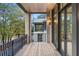 Spacious balcony features a wooden deck and modern railing at 94 Sheridan Dr, Atlanta, GA 30305