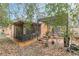 Cozy backyard showcasing a screened-in porch, inviting patio seating, and a serene garden area at 1736 Thompson Ave, Atlanta, GA 30344