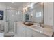 Modern bathroom with a glass-enclosed shower and double vanity at 1736 Thompson Ave, Atlanta, GA 30344