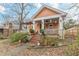 Charming craftsman home with a inviting front porch and stone walkway at 1736 Thompson Ave, Atlanta, GA 30344