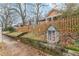 Charming craftsman home with a picket fence and a little free library at 1736 Thompson Ave, Atlanta, GA 30344