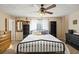 Spacious bedroom with a ceiling fan and large bed at 2778 Majestic Cir, Dacula, GA 30019