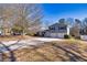 Two-story house with blue siding, white brick, and a two-car garage at 2778 Majestic Cir, Dacula, GA 30019