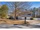 Two-story house with blue siding, white brick, and a two-car garage at 2778 Majestic Cir, Dacula, GA 30019