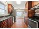 Updated kitchen featuring stainless steel appliances and wood cabinets at 2778 Majestic Cir, Dacula, GA 30019