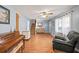 Living room with hardwood floors, staircase, and ceiling fan at 2778 Majestic Cir, Dacula, GA 30019