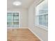 Light-filled dining area with hardwood floors and sliding glass doors at 2836 Crescendo Dr, Atlanta, GA 30318