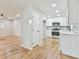 Modern kitchen with white cabinets, stainless steel appliances, and quartz countertops at 2836 Crescendo Dr, Atlanta, GA 30318