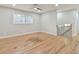 Open living room with hardwood floors and a staircase to upper level at 2836 Crescendo Dr, Atlanta, GA 30318