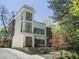 Stylish three-story home, modern facade, landscaped yard at 697 Kendall Ne St, Atlanta, GA 30312