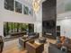 Spacious living area with a double-height ceiling and modern fireplace at 697 Kendall Ne St, Atlanta, GA 30312