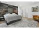 Spacious main bedroom with plush bed and sitting area at 697 Kendall Ne St, Atlanta, GA 30312