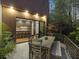 Outdoor patio with wooden dining table and chairs at 697 Kendall Ne St, Atlanta, GA 30312