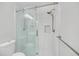 A modern glass enclosed shower with white subway tiles and a tiled wall niche at 218 Forkner Dr # D, Decatur, GA 30030