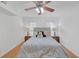 Bedroom with a ceiling fan, neutral walls, and cozy decor at 218 Forkner Dr # D, Decatur, GA 30030
