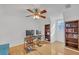 Bright bedroom with hardwood floors, built-in bookcase and a large window at 218 Forkner Dr # D, Decatur, GA 30030