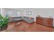 Cozy living room with hardwood floors, large grey couch, and ample natural light at 218 Forkner Dr # D, Decatur, GA 30030