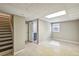Unfinished basement with full bathroom and stairs at 458 Holly Nw St, Atlanta, GA 30318