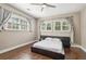 Bedroom with wood floors, window, ceiling fan, and a full bed at 458 Holly Nw St, Atlanta, GA 30318