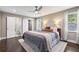 Spacious primary bedroom with wood floors and en-suite bathroom at 458 Holly Nw St, Atlanta, GA 30318