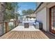 Relaxing deck with sectional sofa and fire pit at 458 Holly Nw St, Atlanta, GA 30318