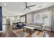 Open living room with hardwood floors, and a view into the kitchen at 458 Holly Nw St, Atlanta, GA 30318