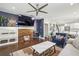 Spacious living room with hardwood floors, fireplace, and built-in shelving at 458 Holly Nw St, Atlanta, GA 30318