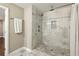 Large walk-in shower with marble tile and modern fixtures at 458 Holly Nw St, Atlanta, GA 30318
