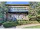 Lovely back exterior featuring a second story balcony and attractive landscaping at 5890 Bond St, Cumming, GA 30040
