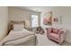 Charming bedroom with a twin bed, window, and art at 1591 Salem Dr # 76, Conyers, GA 30013