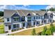 Row of charming townhouses with gray and blue accents at 1591 Salem Dr # 76, Conyers, GA 30013