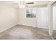 Bright bedroom with neutral walls, carpet, and ample closet space at 5224 Martins Crossing Rd, Stone Mountain, GA 30088