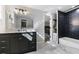 Basement bathroom with dark vanity and view of bedroom at 9585 Hutcheson Ferry Rd, Palmetto, GA 30268