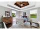 Well-lit bedroom with two windows and dresser at 9585 Hutcheson Ferry Rd, Palmetto, GA 30268