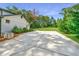 Large concrete driveway with ample parking space at 9585 Hutcheson Ferry Rd, Palmetto, GA 30268