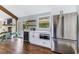 Kitchen with white cabinets, quartz countertops, wine cooler, and stainless steel appliances at 9585 Hutcheson Ferry Rd, Palmetto, GA 30268