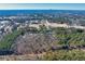 Aerial view of property with large wooded area at 3228 Rosebud Rd, Loganville, GA 30052