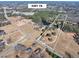 8.48 acres bordering Hwy 78. Features a pond and home at 3228 Rosebud Rd, Loganville, GA 30052