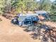 Overhead view of a property with multiple buildings and land at 3228 Rosebud Rd, Loganville, GA 30052
