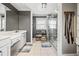 Elegant bathroom with double vanity, large shower, and tile floors at 3228 Rosebud Rd, Loganville, GA 30052